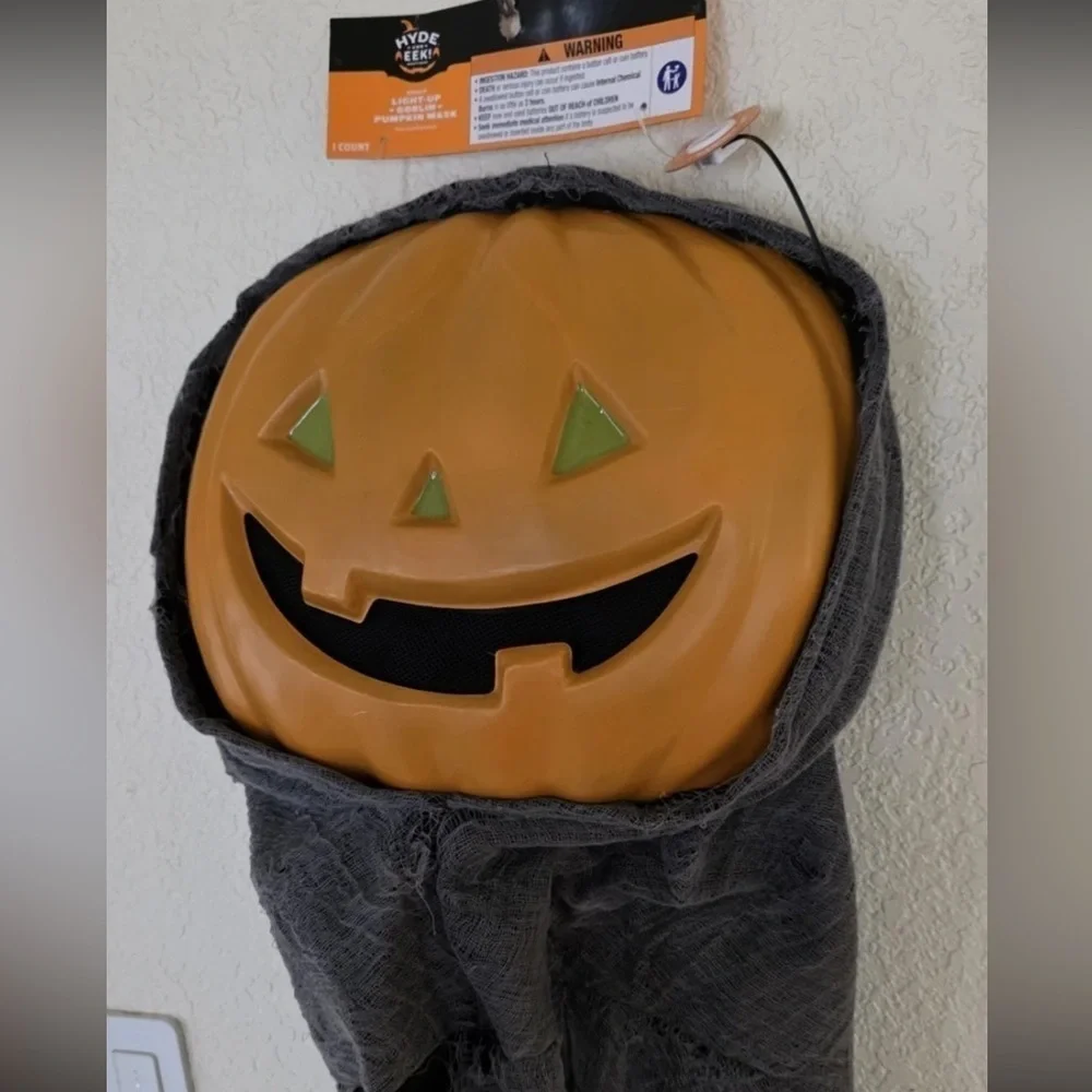 Light-Up Pumpkin Halloween Mask. One size fits most